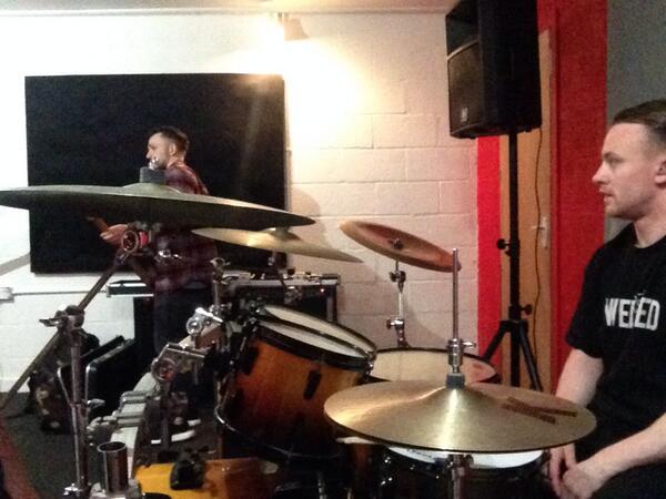 Practicing our songs for the rock show this weekend aren't we