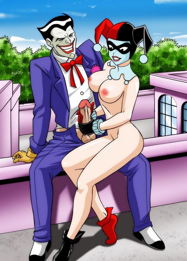 Harley Quinn gives Joker a handjob in public. 