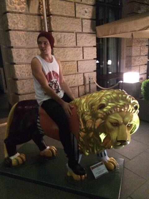 Ashton5SOS's tweet photo. Hi, bet ya didn't know I can ride lions #boom http://t.co/rFYNZj7vzP