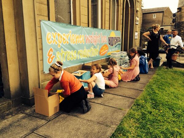 Manyhands_99's tweet photo. The girls getting the goody bags ready for Sunday. Still time to get your running numbers. http://t.co/nPPq48Nsoy