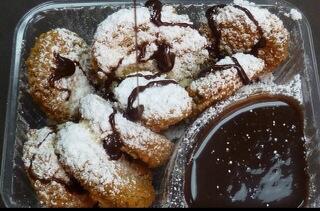 darrenrovell's tweet photo. Fried Pickles with chocolate sauce that will be served at Minnesota State Fair http://t.co/5h8Y3cYJuY
