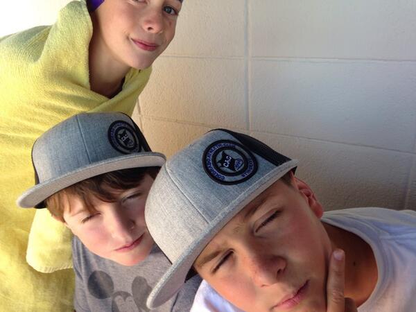 CACswimming's tweet image. Super stylin' in our new hats. #cacswag #misports #LCM2014