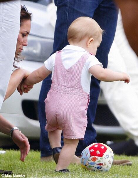 baby kicking soccer ball