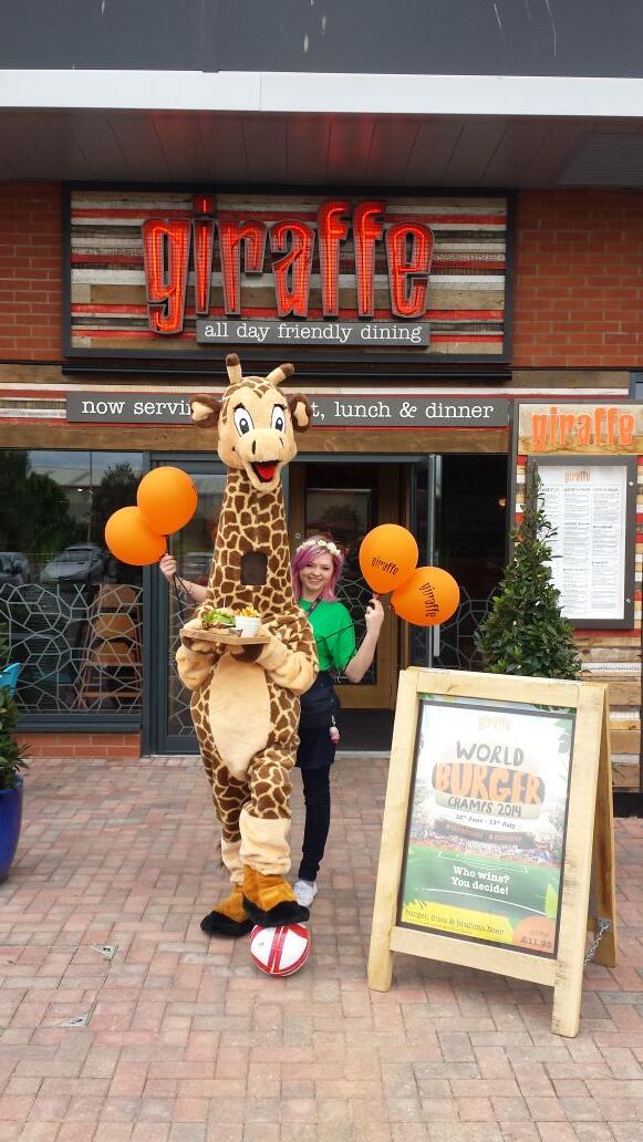 tescowisbech's tweet photo. It's not often you see a giraffe playing football holding a burger! A great World Cup deal at our neighbours Giraffe http://t.co/WYuUQ6xfy1