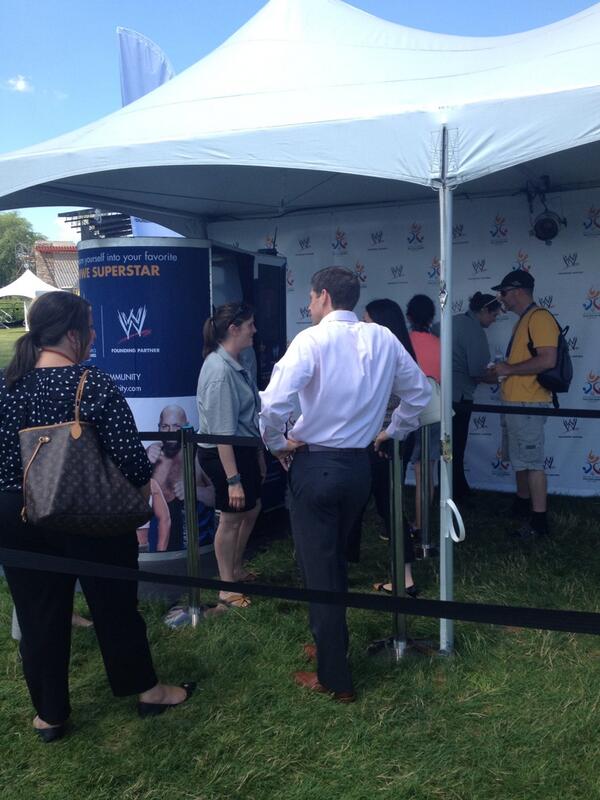 WWECommunity's tweet image. Scenes from Corporate Park! The @wwe Face of A Champion photo booth is up and running! @2014USAGames #2014USAGames