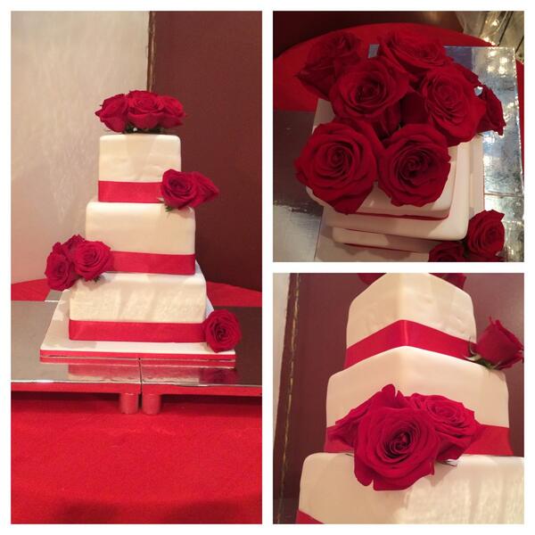Beautiful chocolate wedding cake covered in white fondant with fresh flowers. So beautiful and smelled so good!