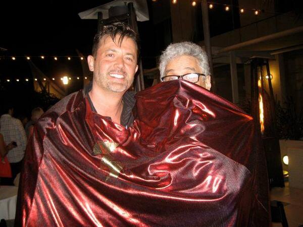 stephanpastis's tweet image. Me drunk.  Wearing cape.  Wrapping it around Mutts creator Patrick McDonnell.