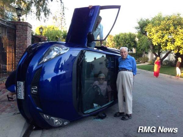 HaraldDoornbos's tweet photo. Pic of the day. :) RT  @PzFeed WHOA: Elderly couple flips car, takes pic while wife is still inside. Via NBC http://t.co/5PcmnPIl57