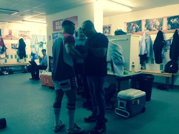 WiganWarriorsRL's tweet photo. Callum Wright receiving his debut jersey from his Dad. Special night http://t.co/WGDwEefSXJ