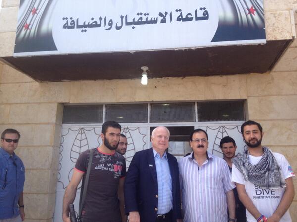 ISIS puts out photo of members chillin' with John McCain In Syriasn