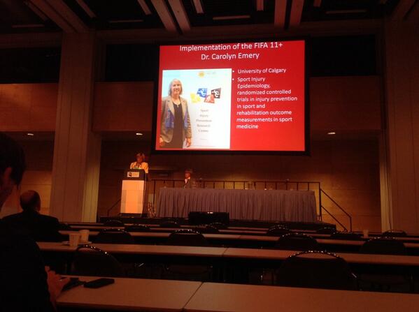 CJSMonline's tweet photo. Dr Cathy Campbell introduces Dr Carolyn Emery presenting on the Implementation of the @FIFAcom #FIFA11+ #FIMS2014 http://t.co/DJro1t0dMG