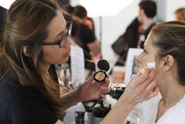 Our very own Pom Pavee showing clients what our #DualSalmonConcealer can do! #tbt #evepearl