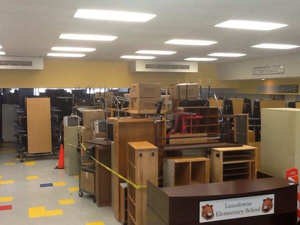 The cafeteria and gym are packed with furniture as the renovation begins at Lansdowne!