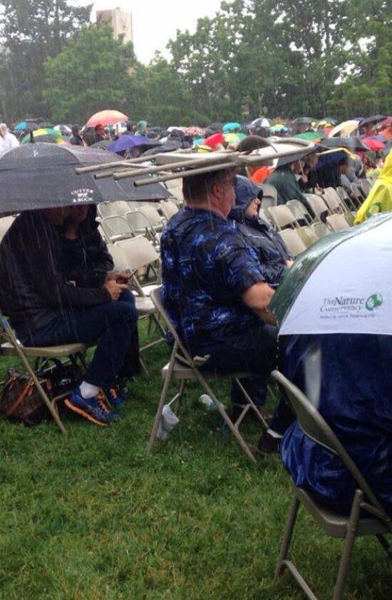 NewsRedefined's tweet image. College graduations happen rain or shine.