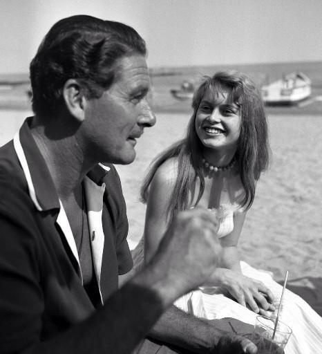 RobertWRossEsq's tweet photo. Errol Flynn with an old whisky & a young Brigitte Bardot. Pretty much his perfect day. #PreciousImages http://t.co/zRbcSKX1np