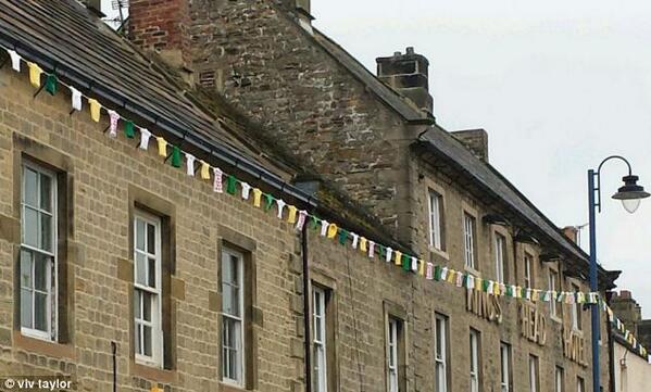 Safety alert - knitted bunting may bend lamp posts! dailym.ai/1lQ3cFq #knitting #bunting #tourdefrance