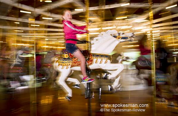 Spokesman_Photo's tweet photo. .@cmulvany photo: Ally Jones on the #LooffCarrousel in #RiverfrontPark in #Spokane .
http://t.co/1MQLz6qGv3 http://t.co/dfvmtkCEnB