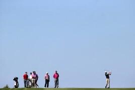 irishexaminer's tweet photo. Irish are lining up to shoot down flying Finn #irishopen2014 #ieopen http://t.co/89ykB6IZ82 http://t.co/rY2afyyhki