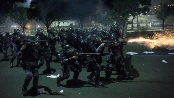 YourAnonCentral's tweet photo. #Brazil :#Police arrested a number of anti-#WorldCup protesters 
Via @PressTV 
http://t.co/rjcuzEZLjh http://t.co/BsyL0RGzGP