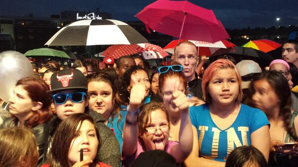 Show on hold. Pouring rain, lightning 'n thunder. 'We want Billy! We want Billy!' #ADL2014 #Winnipeg