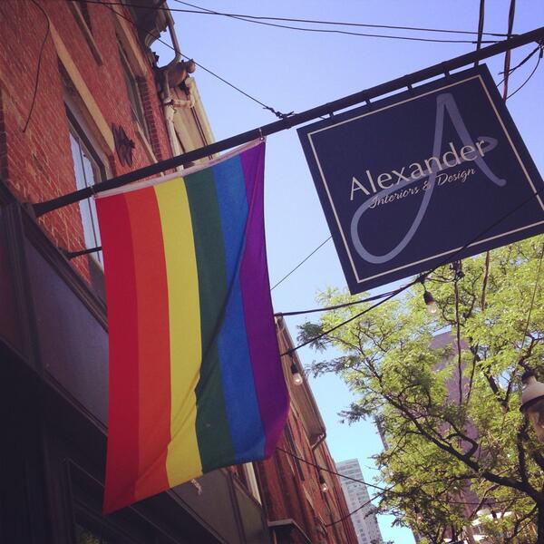 AlexanderAtHome's tweet image. A little #colour &amp;amp; #pride flying on the front of the shop. #WorldPrideToronto @GlenandJamie #pride2014 #toronto