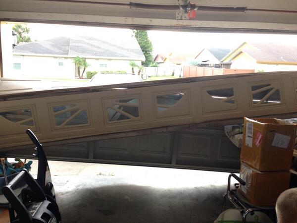 Alhamdullilah's tweet photo. Never a good thing when ur garage door does this! #ishouldntbealive #justmyluck #wth http://t.co/Zpz5bMbHdb