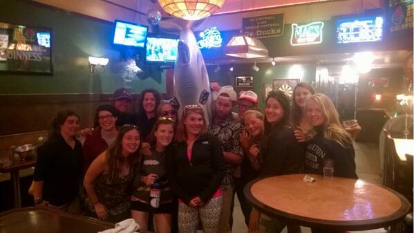 Team photo with our great bar tender and a special dolphin appearance! Free popcorn!!! Thanks, Max's!
