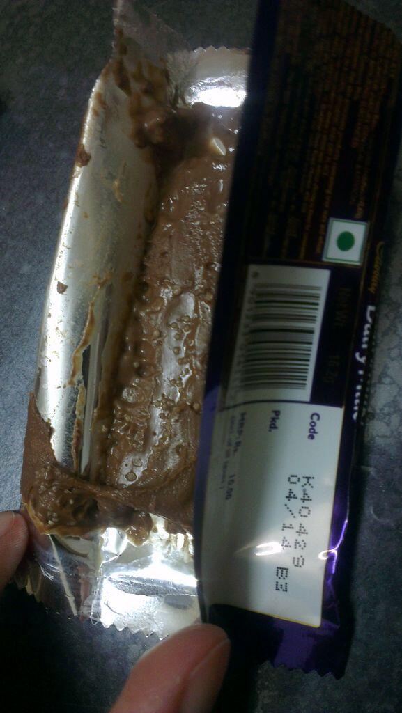 PriyaSharma_10's tweet photo. Bought #DairyMilk and this is what I found inside. Bubbles and spoiled. #complaint @forbes_india  http://t.co/ZsXQFd9q5J