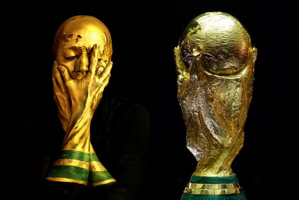 Yahoo's tweet photo. Artist transforms herself into #WorldCup trophy: http://t.co/QsSWeQCl0U http://t.co/y1zLouXmTE