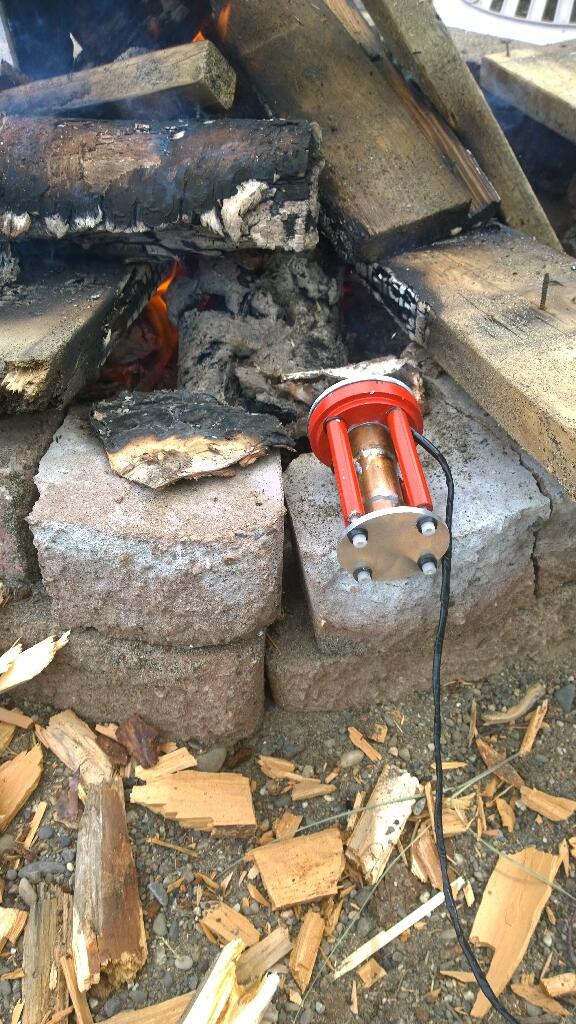 StampTEG's tweet photo. Prototype testing around the campfire! http://t.co/1jl52pC740