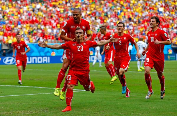 BBCSport's tweet image. FT: #HON 0-3 #SUI. Xherdan Shaqiri hat-trick secures #SUI round of 16 #WorldCup spot. bbc.in/1jP6ZTY #HONSUI