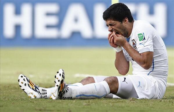 Squawka's tweet photo. BREAKING: Luis Suarez has received a 9-game Uruguay ban plus a 4-month ban from all of football. WOAH! #URU #LFC http://t.co/uKznK46vy5