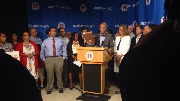 cristiparker's tweet photo. .@blibal of @Grassroots_News holding up more than 500 petitions from #austin residents who want scomm out! #19toomany http://t.co/PJJbHJujt3