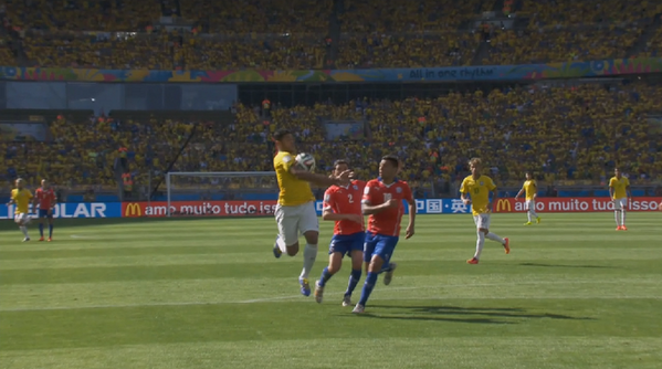BrO9LLSCAAADats Howard Webb rules out Hulks goal v Chile for handball, pictures show there was some contact with arm