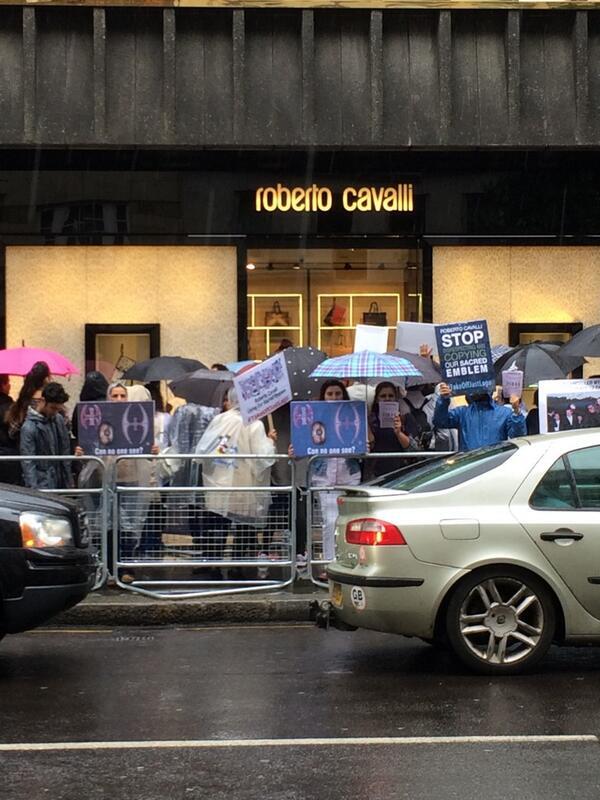ShirvaniMahnaz's tweet photo. #@londonbnews London Harrods &amp; CavalliStore .Many Protesters, Placards, Cameras.. &amp; Only 1 Voice #TakeOffJustLogo http://t.co/zo7YlJQ71r”