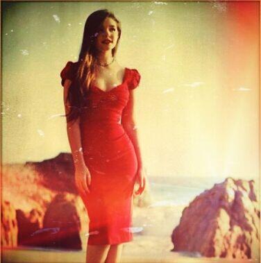 I am not capable to be seductive in any way. So enjoy a picture of me in a red dress instead.