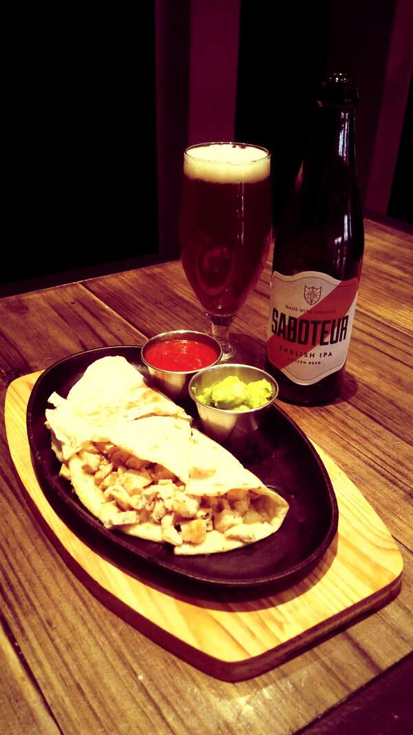 Chicken Quasadillas perfectly paired with <a href="/CitizenBeer/">Citizen</a> Saboteur English IPA only at #RocketsLolitas