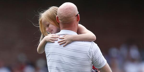 MLB's tweet photo. A young fan got to replace the bases in SD. Then got the surprise of a lifetime: http://t.co/W1Mrn7roiU #TroopThanks http://t.co/fxNJMonlbY