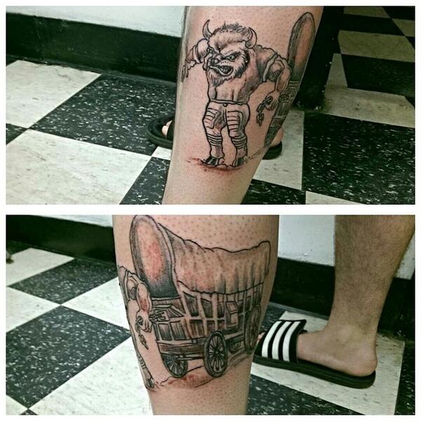 Bills Fan Gets Tattoo Of Andy Dalton Jumping Through A Table Another Fan  Gets Tattoo Of His Face