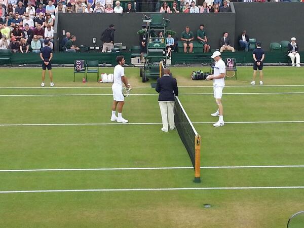 Jeff_Whitfield's tweet photo. Despite the weather, enjoyed my first visit to @Wimbledon for big serve-off between @JohnIsner and @feliciano_lopez http://t.co/b9sDGnHnCL