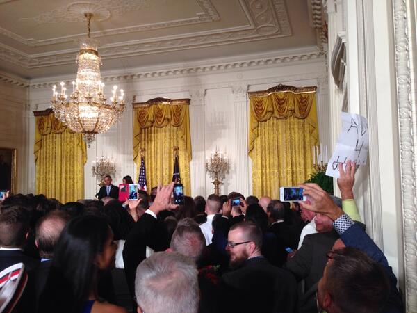 Happening now at the White House. See "Add 4 Words" sign to the right