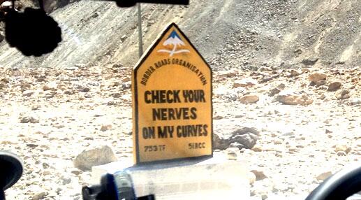 MasalaBai's tweet photo. My colleague took these photos of 14 brilliant road signs from Leh. http://t.co/17jeGxMtSr http://t.co/8sMVZtpuUb