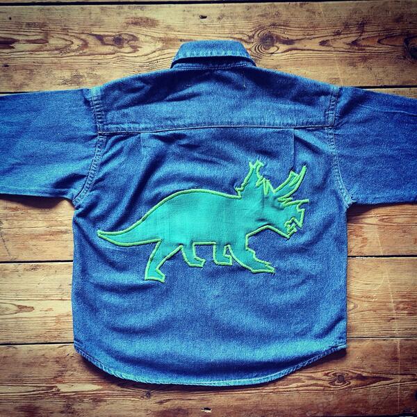 poppyseedshop's tweet photo. Triceratops rocks shirt at @CuriousCMarket this Saturday. 100% recycled and unique for the coolest kids in town http://t.co/WDIu3sTsaO