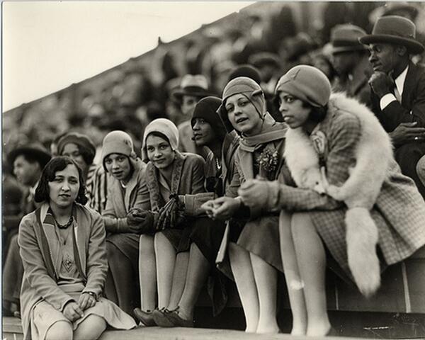 HitWithHistory's tweet image. Black flappers enjoying a football game at Howard University-1920's