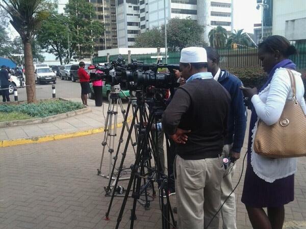 K24Tv's tweet photo. Journalist awaiting the caucus chair at parliament buildings.#ParliamentaryCaucus http://t.co/QHEpm18DCP