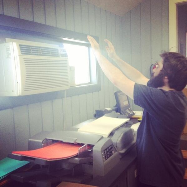 impressionprint's tweet photo. It's a hot one today. Chris, our Digital Print Specialist, has found his home in front of the AC. http://t.co/FvuRKpwinL