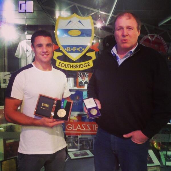 Ex All Black Albie Anderson making me look tiny standing with his 1987 winning WC medal as I show off my 2011 beauty