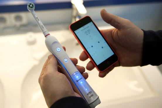 Kolibree's tweet image. Phone or Toothbrush? #CoolStudy on.wsj.com/1qSJn6g With @Kolibree, no need to choose! #BrushUp