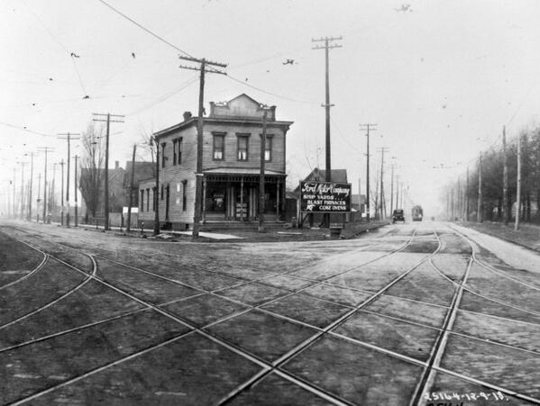 #ThrowbackThursday to 1918 of the Ford Rouge Plant sign on a street