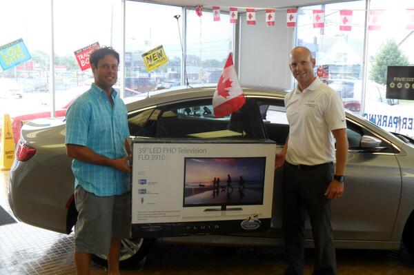 Craig Hardwood picking up his FREE 39' inch TV from Elgin Chrysler! #dontmissout #onlyatElgin